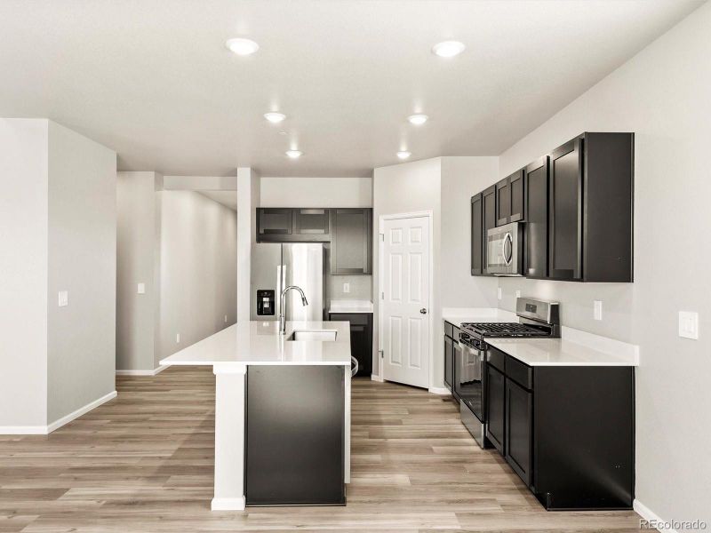 Furnished interior view inside a new home in Buffalo Highlands: The Flora Collection, Commerce City (Image 3).