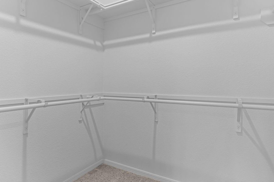 A view of your large primary walk-in Closet A view of your large primary walk-in Closet