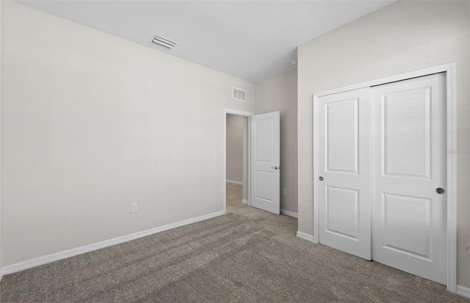 Spacious, unfurnished interior of a new home in The Strand at Cedar Grove, North Port (Image 13).