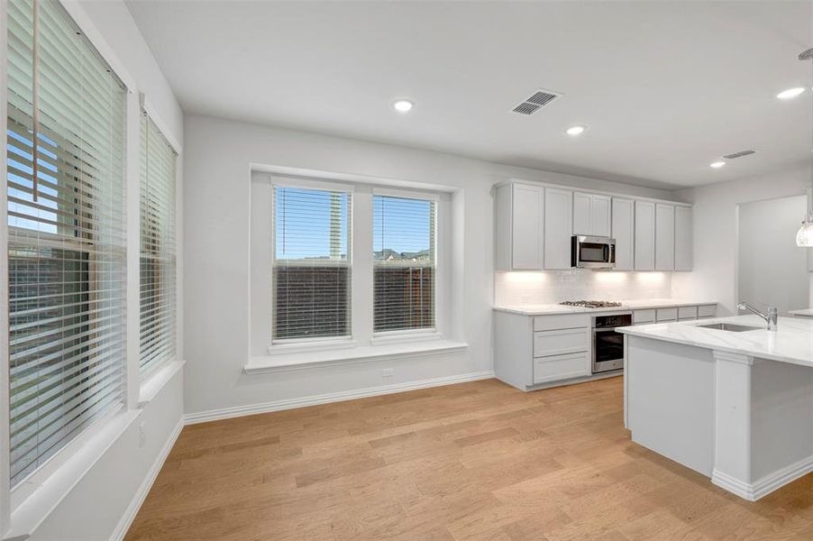 Furnished interior view inside a new home in Lilyana, Celina (Image 15).