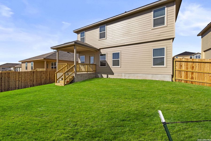 Exterior details and patio area of a home in Redbird Ranch, San Antonio (Image 3).