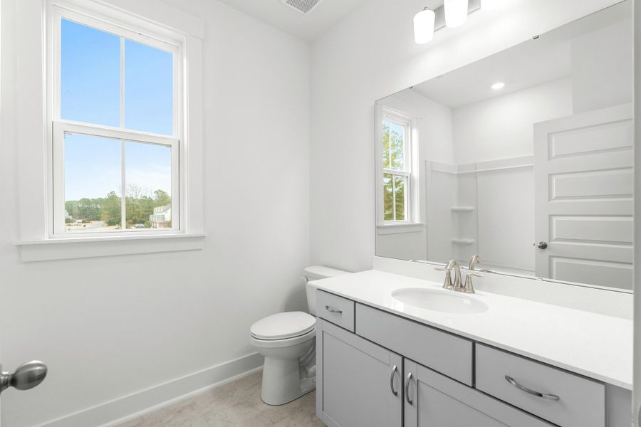 Furnished interior view inside a new home in Long Bay Golf Club, Longs (Image 15).