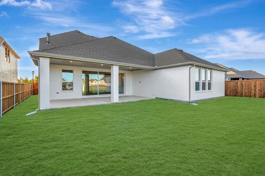 Exterior details and patio area of a home in Wellington, Fort Worth (Image 24).