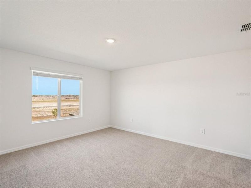 Spacious, unfurnished interior of a new home in Coasterra - Premier Series, Palmetto (Image 9).