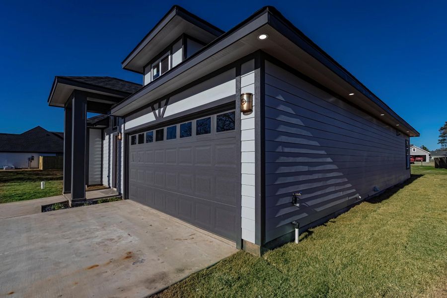 Front exterior of a new home in , Livingston, TX, highlighting curb appeal (Image 2). Front exterior of a new home in , Livingston, TX, highlighting curb appeal (Image 2).