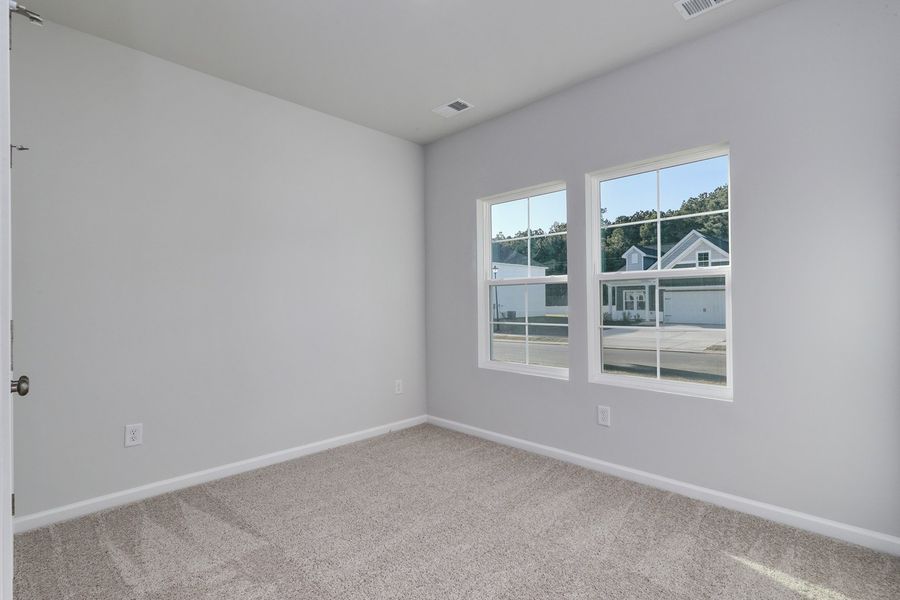 Spacious, unfurnished interior of a new home in Hainer Place, Conway (Image 23).