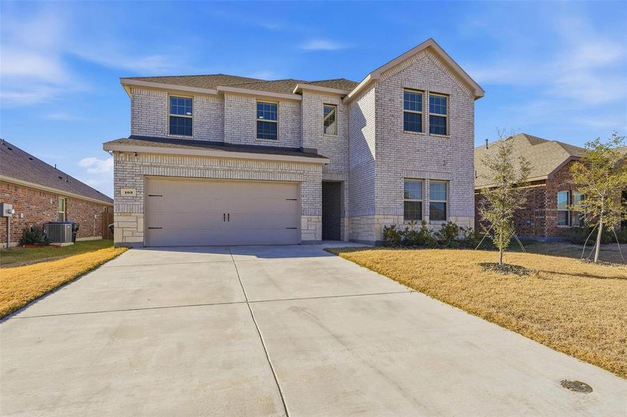 Front exterior of a new home in , Caddo Mills, TX, highlighting curb appeal (Image 2). Front exterior of a new home in , Caddo Mills, TX, highlighting curb appeal (Image 2).