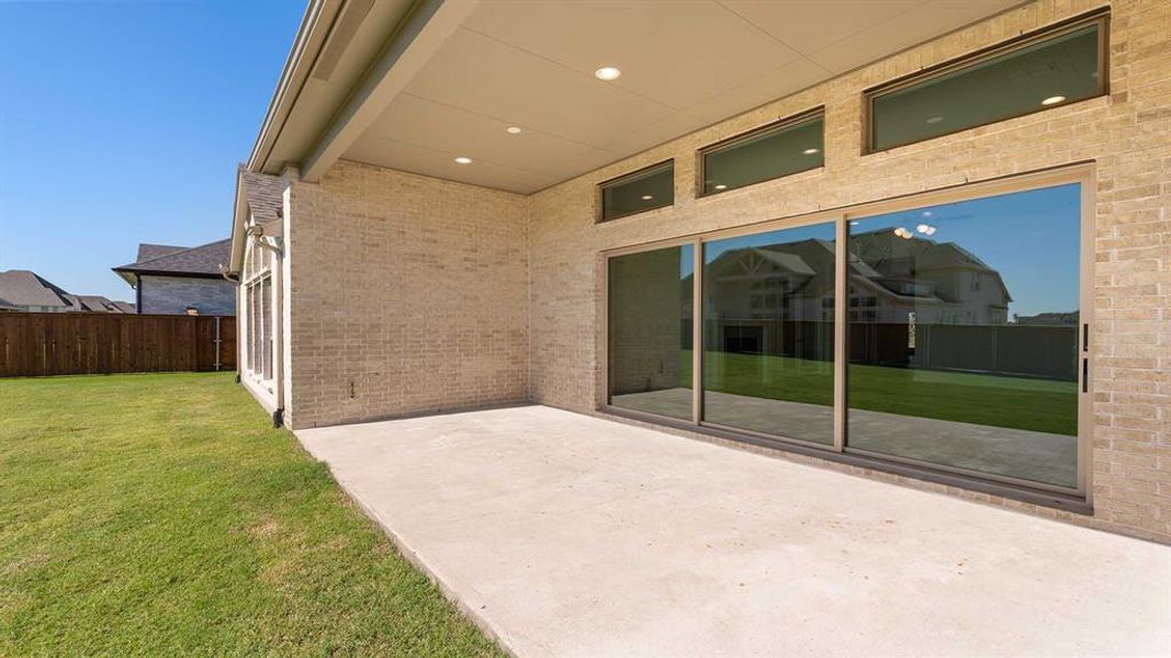Exterior details and patio area of a home in Somerset Park 80', Rockwall (Image 3).