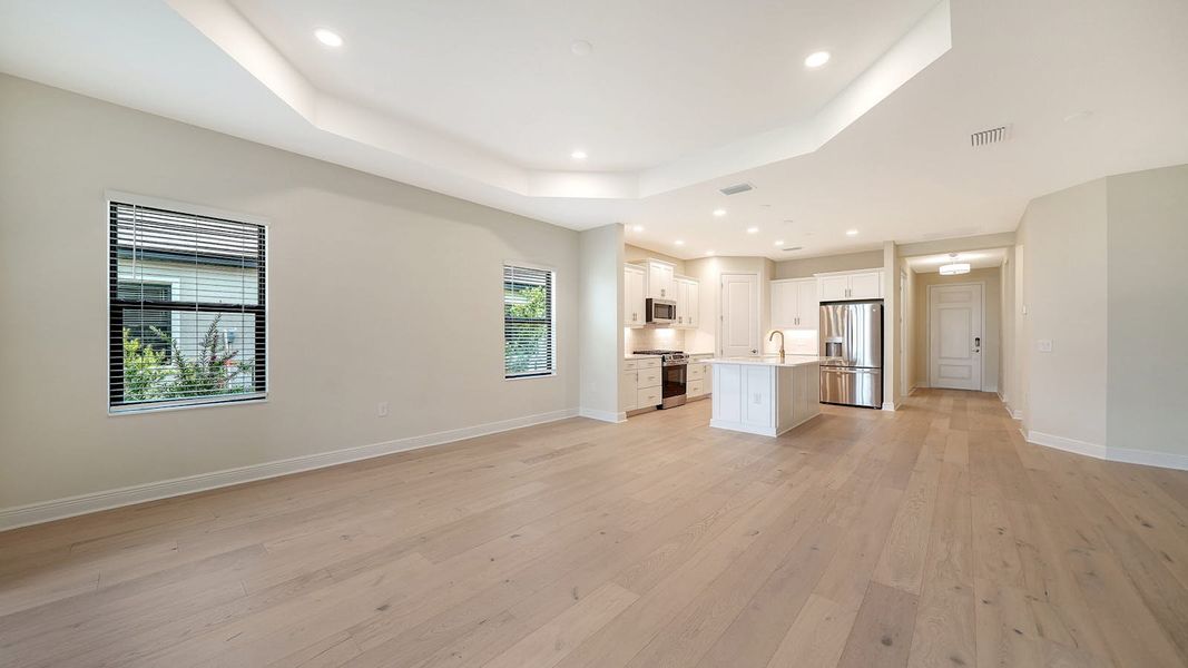 Spacious, unfurnished interior of a new home in Vistera of Venice Real Estate and Homes for Sale in Venice, FL - Neal Communities, Nokomis (Image 15).