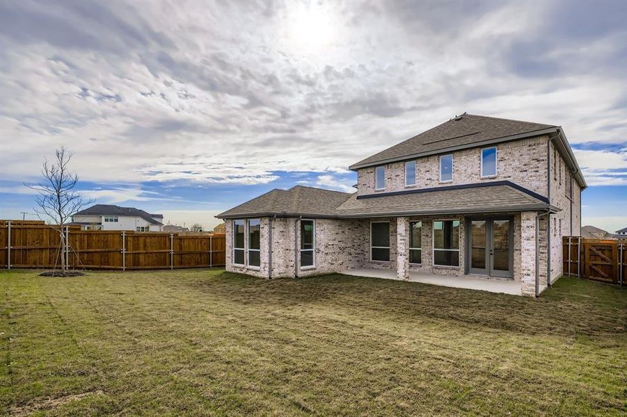 Exterior details and patio area of a home in Ten Mile Creek 55s, Celina (Image 17).