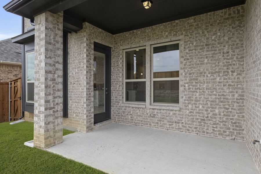 Exterior details and patio area of a home in Brookshire at Legacy Hills, Celina (Image 2).