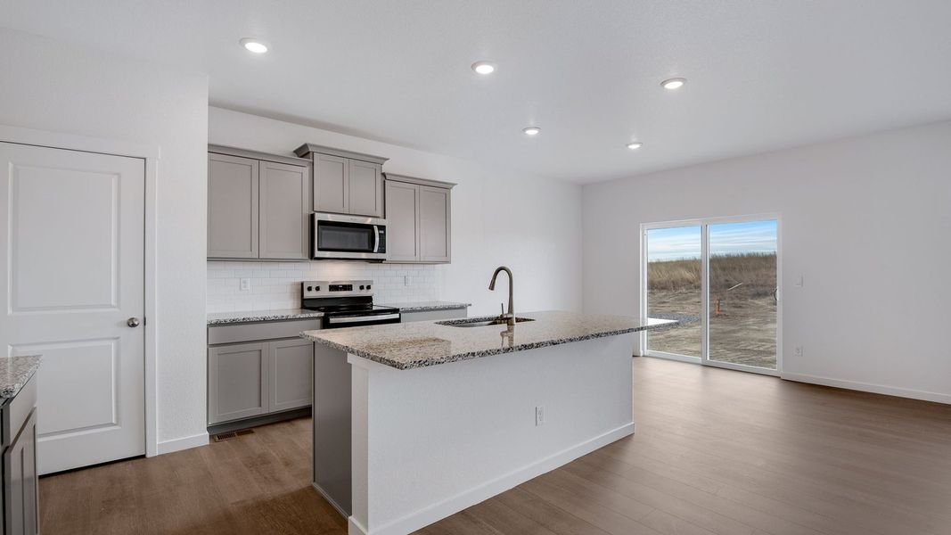 Furnished interior view inside a new home in Silver Peaks, Lochbuie (Image 5).