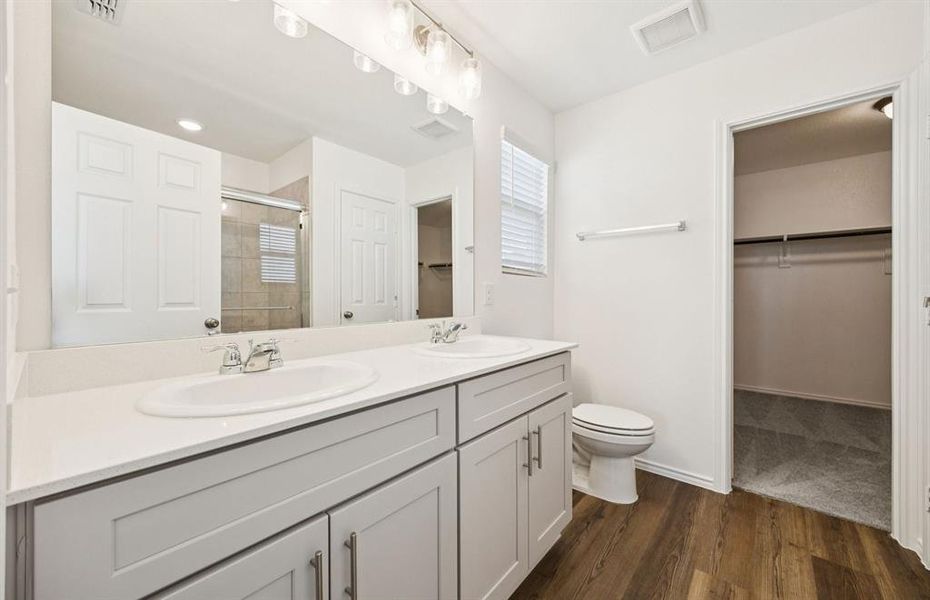 Owner's private bath with double vanity