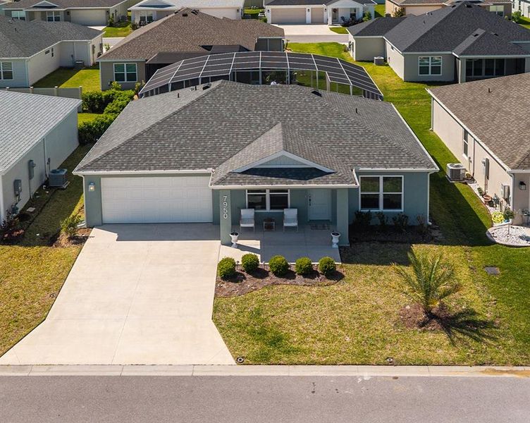 Front exterior of a new home in , The Villages, FL, highlighting curb appeal (Image 27).
