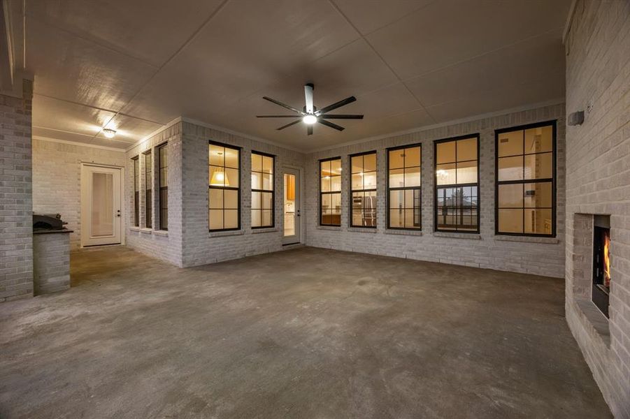 View of patio with a ceiling fan