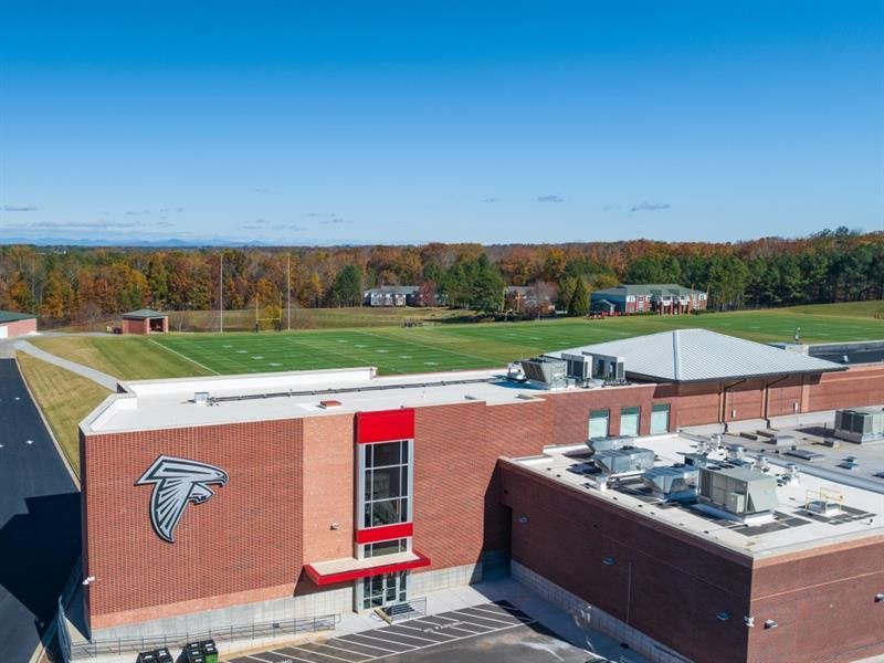 Front exterior of a new home in Waypoint, Flowery Branch, GA, highlighting curb appeal (Image 16).