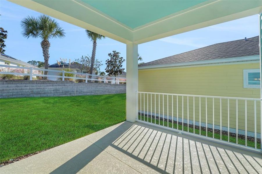 Exterior details and patio area of a home in Green Key Village, Lady Lake (Image 29).