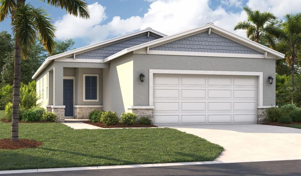 Front exterior of a new home in Watermark, Cocoa, FL, highlighting curb appeal (Image 1).