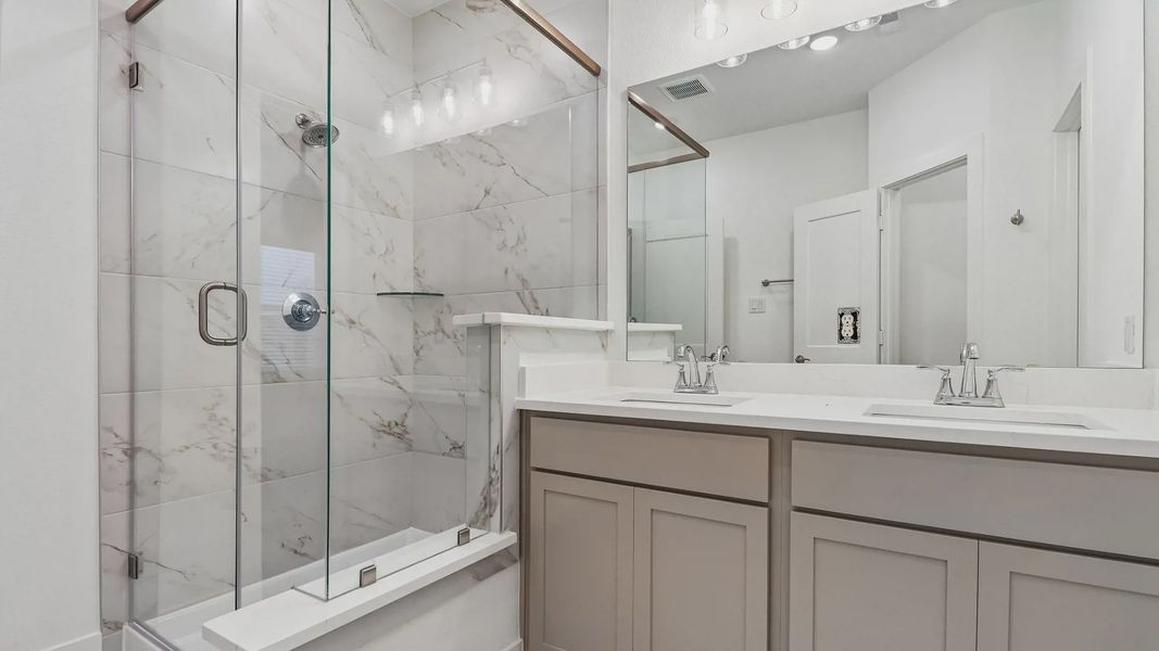 Furnished interior view inside a new home in Meridiana Townhomes, Manvel (Image 31).