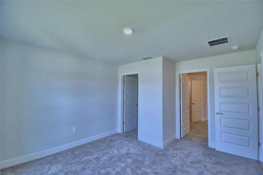 Spacious, unfurnished interior of a new home in Cadence Crossing, Auburndale (Image 27).