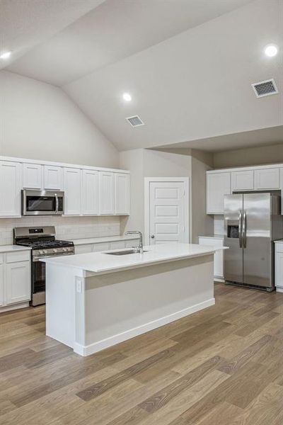 Kitchen in the Wimbledon home plan by Trophy Signature Homes – REPRESENTATIVE PHOTO Kitchen in the Wimbledon home plan by Trophy Signature Homes – REPRESENTATIVE PHOTO