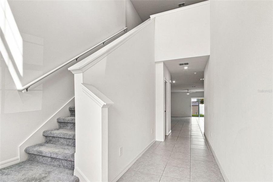 Spacious, unfurnished interior of a new home in The Isle of Avalon, Spring Hill (Image 14).