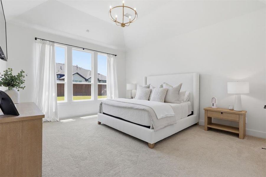 The luxurious primary suite feels like your personal oasis