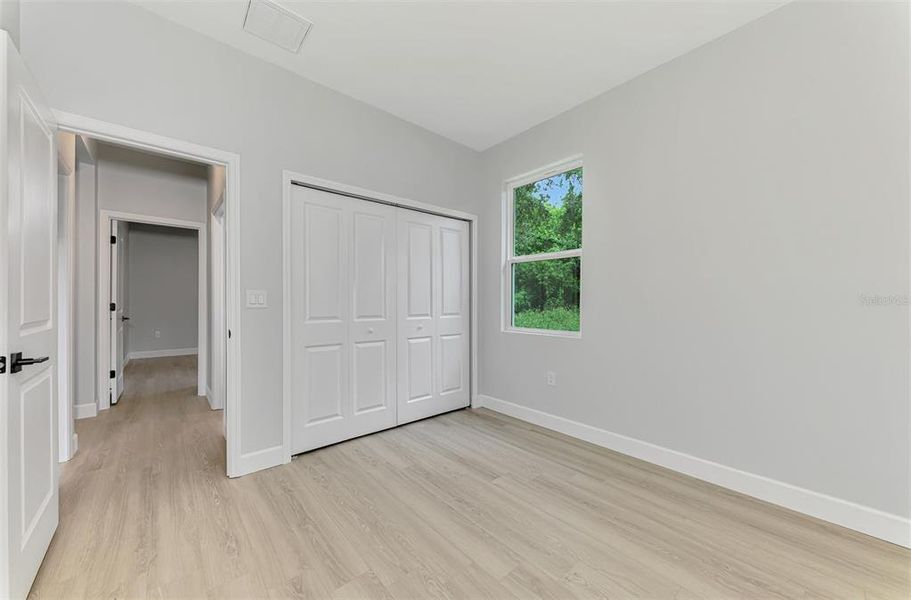 Spacious, unfurnished interior of a new home in , Port Charlotte (Image 15).