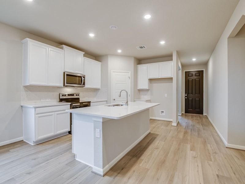 Furnished interior view inside a new home in Remington Ranch, San Antonio (Image 5).