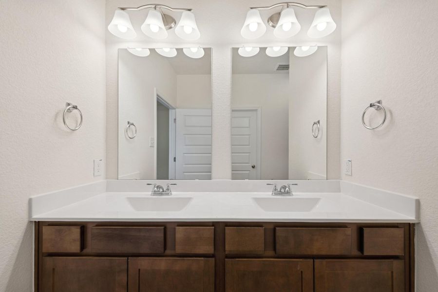 The Mockingbird II- Primary Bathroom with Dual Vanities The Mockingbird II- Primary Bathroom with Dual Vanities