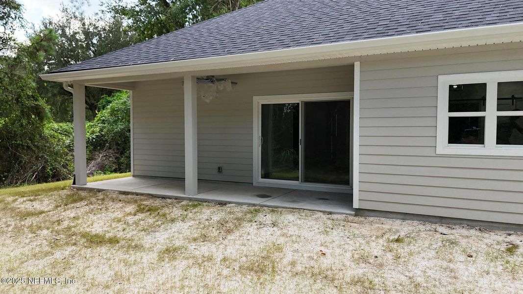 Front exterior of a new home in , Melrose, FL, highlighting curb appeal (Image 22).