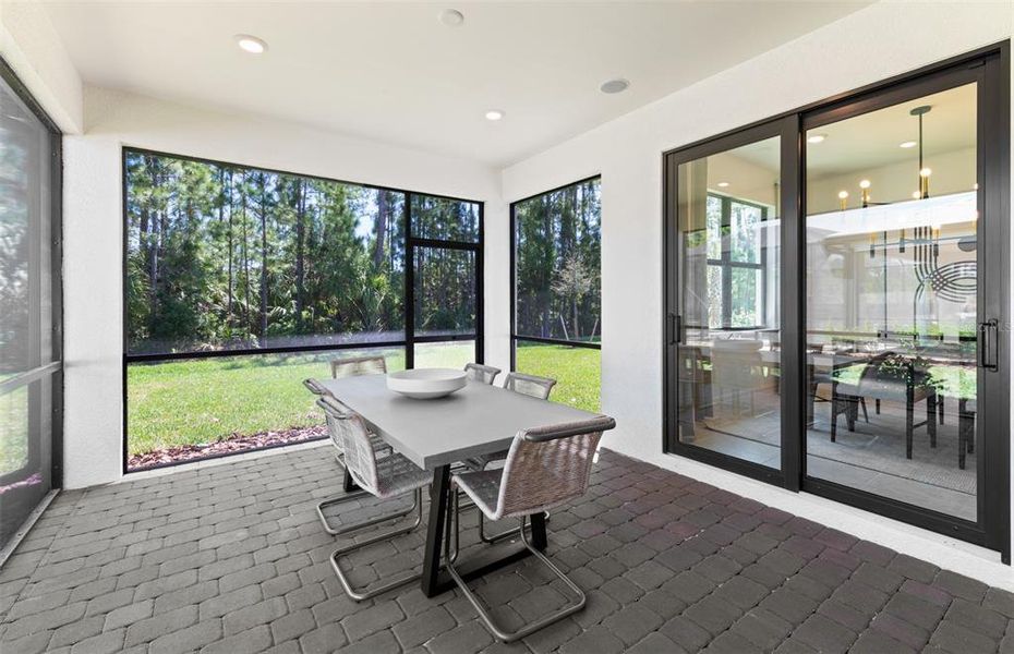 Exterior details and patio area of a home in The Strand at Cedar Grove, North Port (Image 3).