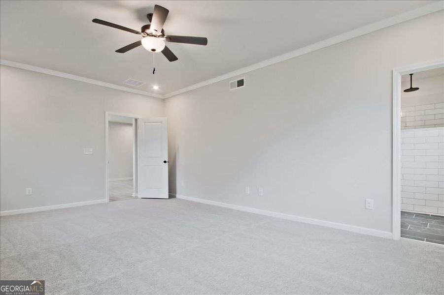Spacious, unfurnished interior of a new home in The Paddocks at Doc Hughes, Buford (Image 46).