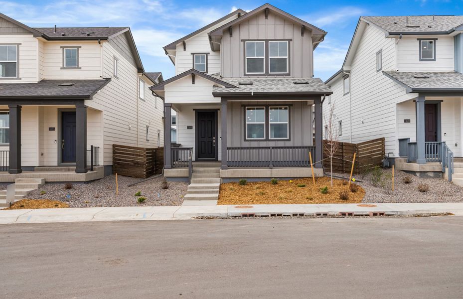 Front exterior of a new home in Barefoot Village, Firestone, CO, highlighting curb appeal (Image 22). Front exterior of a new home in Barefoot Village, Firestone, CO, highlighting curb appeal (Image 22).