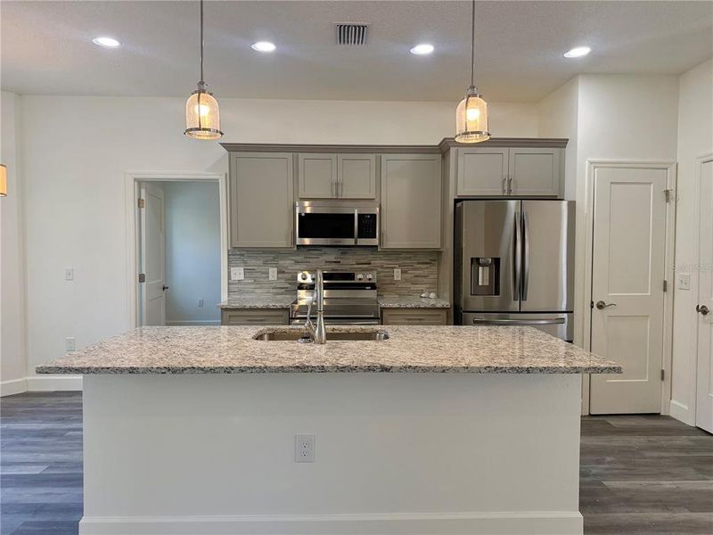 Furnished interior view inside a new home in , Williston (Image 4).