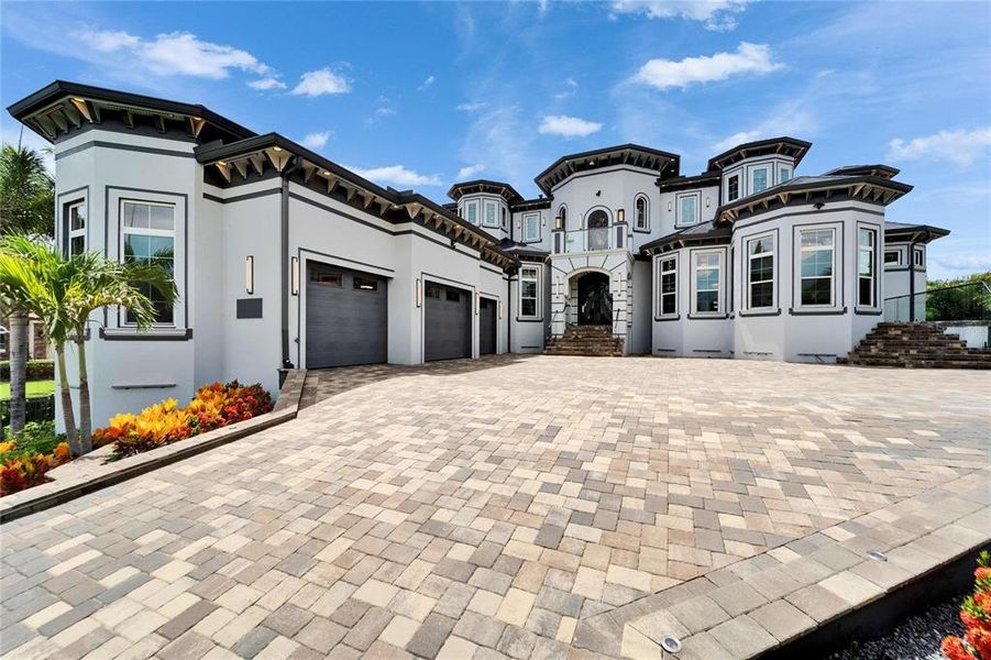 Front exterior of a new home in , Apollo Beach, FL, highlighting curb appeal (Image 25).