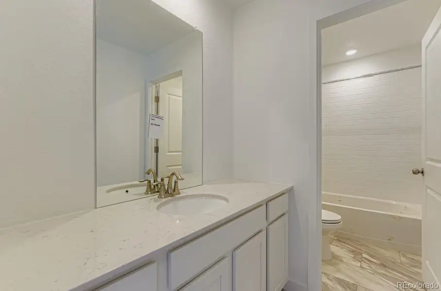 Furnished interior view inside a new home in Vermilion Creek: The Pioneer Collection, Centennial (Image 3).