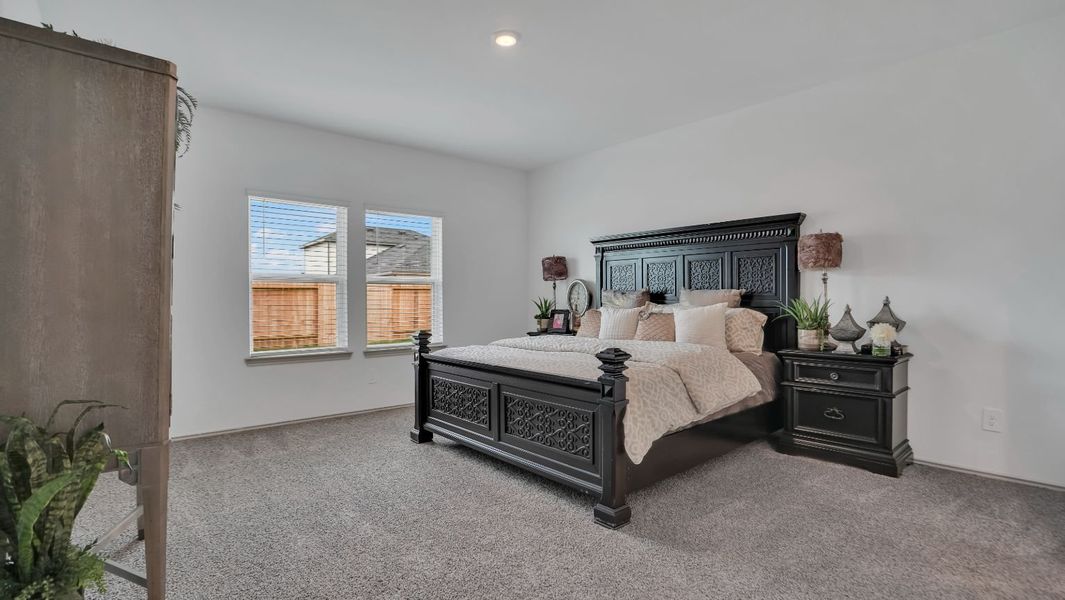 Representative furnished interior of a home built from the MITCHELL by D.R. Horton in Westward Pointe, Sealy (Image 19).