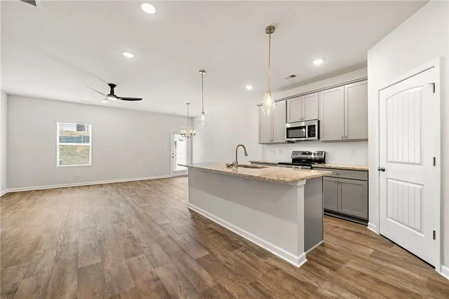 Furnished interior view inside a new home in The Grove At Mundy Mill, Gainesville (Image 6). Furnished interior view inside a new home in The Grove At Mundy Mill, Gainesville (Image 6).