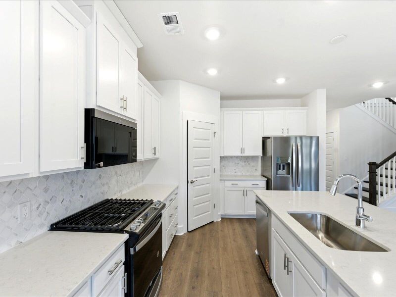 Furnished interior view inside a new home in The Coves at Lakes of Cane Bay II, Summerville (Image 17).
