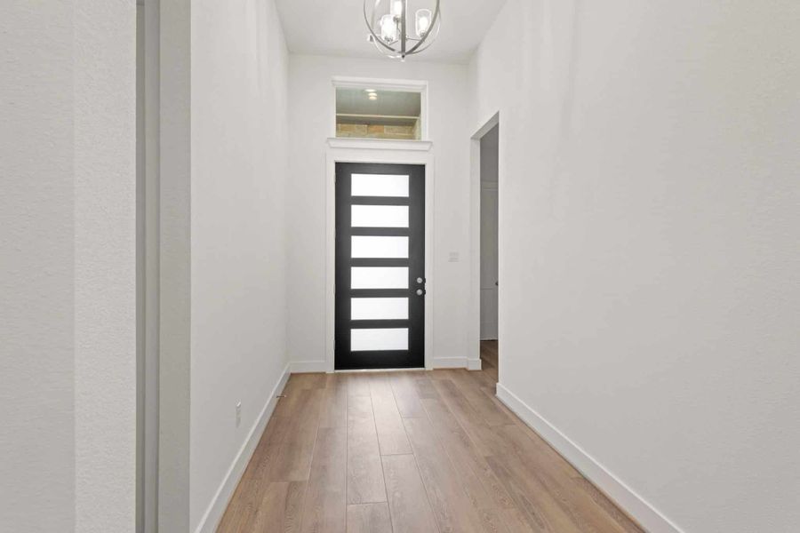 Representative unfurnished interior of a home built from the Malani – 60′ Lot by Chesmar Homes in Fulshear Lakes, Fulshear (Image 14).