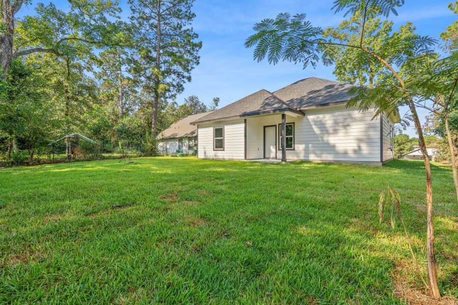 Exterior details and patio area of a home in , Willis (Image 21). Exterior details and patio area of a home in , Willis (Image 21).