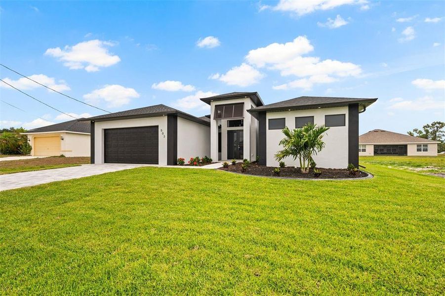 Front exterior of a new home in , Cape Coral, FL, highlighting curb appeal (Image 23).