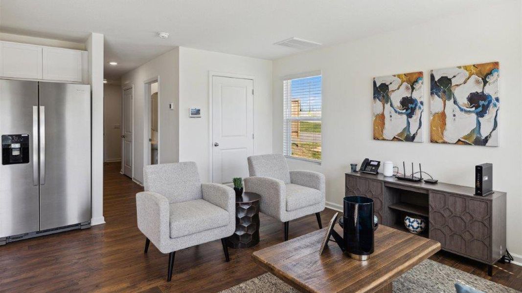 Representative furnished interior of a home built from the Altamont Townhome by D.R. Horton in Belcourt Landing, Cleveland (Image 6).