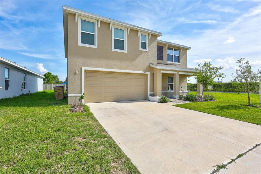 Front exterior of a new home in , Tampa, FL, highlighting curb appeal (Image 26).