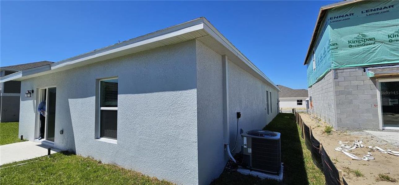 Exterior details and patio area of a home in Cascades, Davenport (Image 2). Exterior details and patio area of a home in Cascades, Davenport (Image 2).