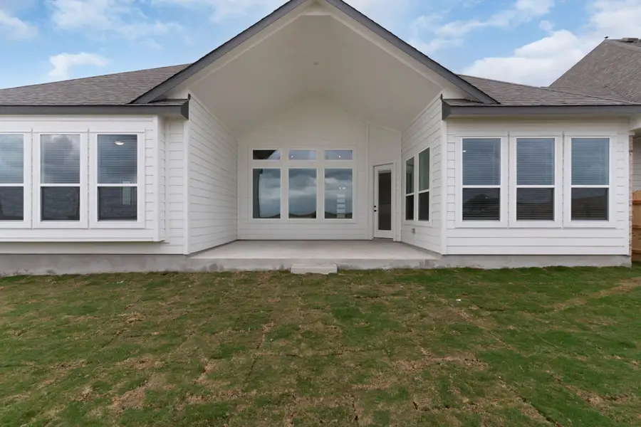 Exterior details and patio area of a home in The Grove at Blackhawk, Pflugerville (Image 3).