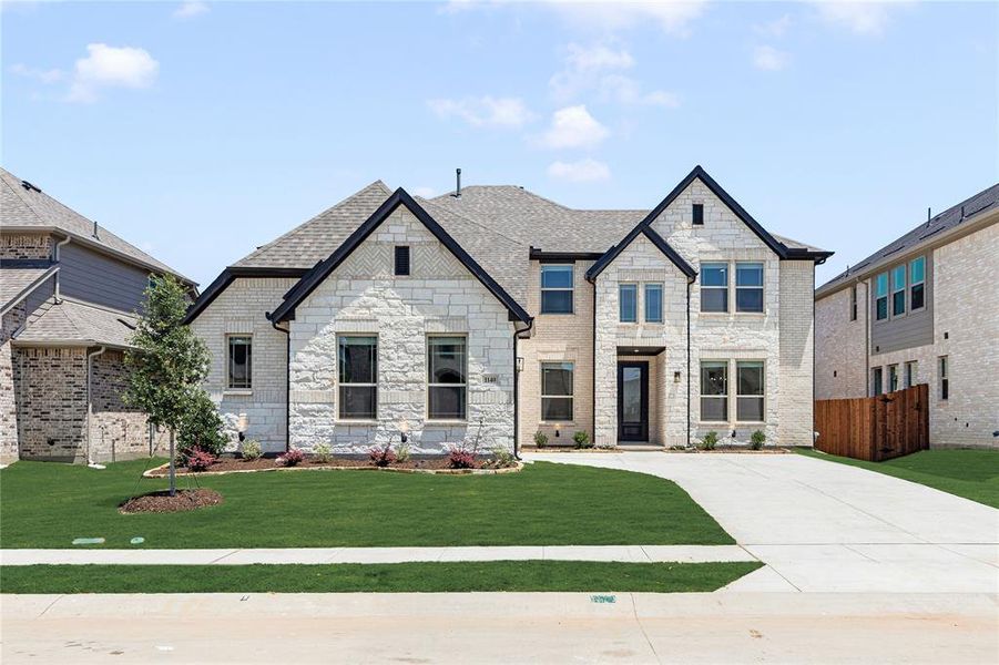 Front exterior of a new home in Chaparral Park, Oak Point, TX, highlighting curb appeal (Image 2).
