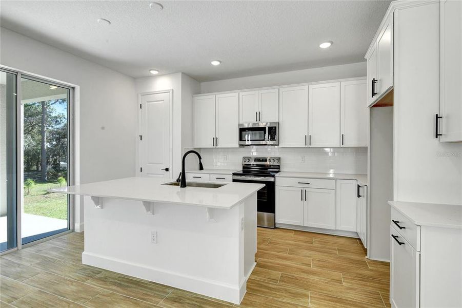 Furnished interior view inside a new home in Seasons at Wekiva Ridge, Mount Dora (Image 6).