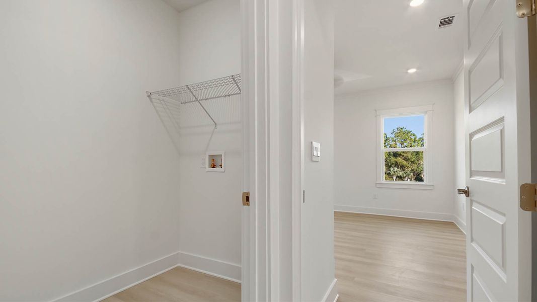 Representative unfurnished interior of a home built from the Trenton by D.R. Horton in Parkside, Santa Rosa Beach (Image 31).